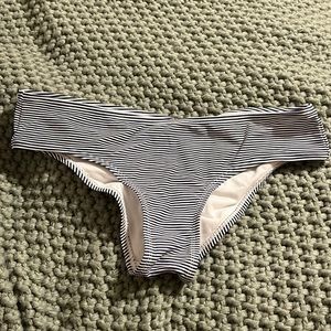 Xhilaration.. blue and white striped bathing suit bottoms.